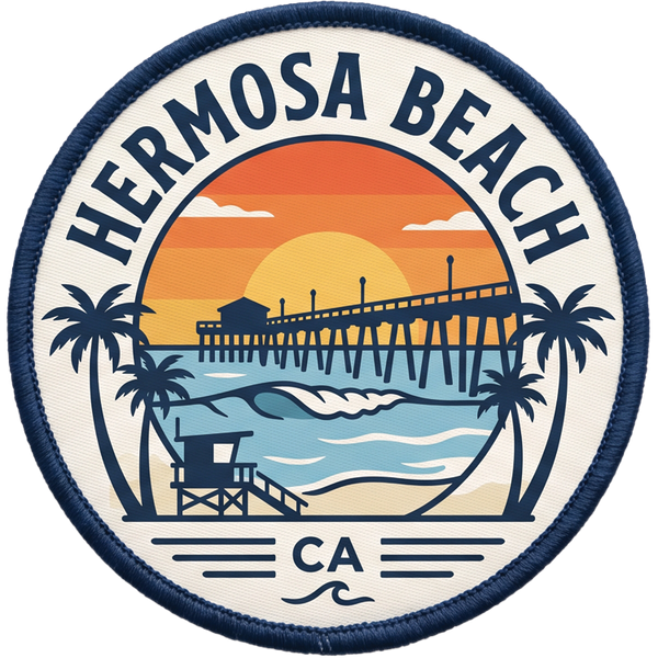 Hermosa Beach hat patch: round navy patch with the Hermosa Beach pier silhouetted against an orange sunset, a lifeguard tower, palm trees, and a breaking wave